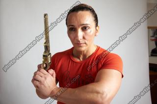 ANGELINA STANDING POSE WITH GUN